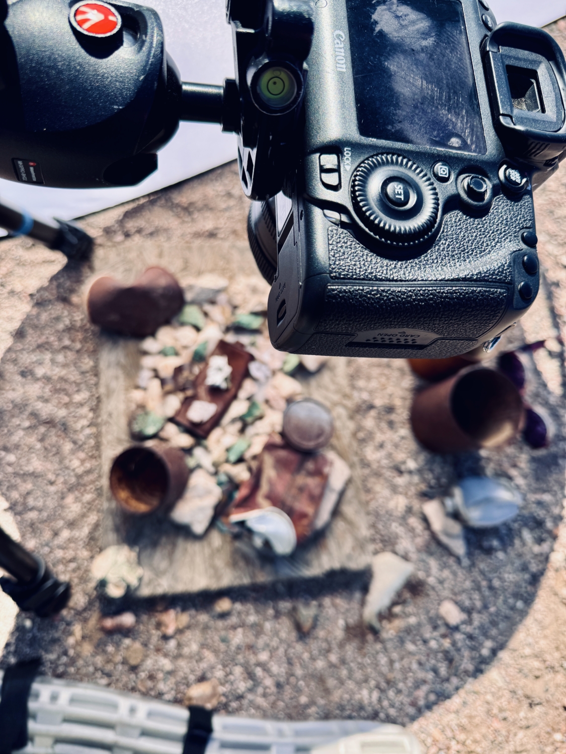 Camera on Tripod hovering over still life