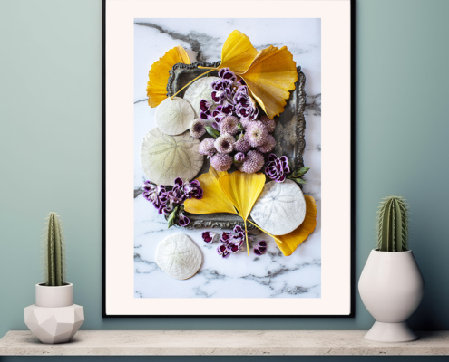 Image of a sliver platter with ginko leaves and purple flowers
